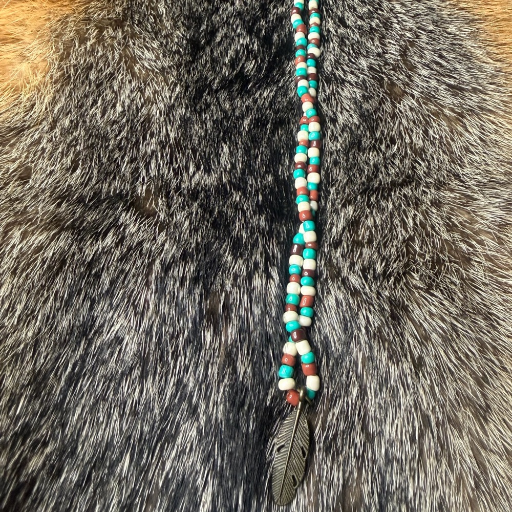 Beaded Necklace with Feather Pendant